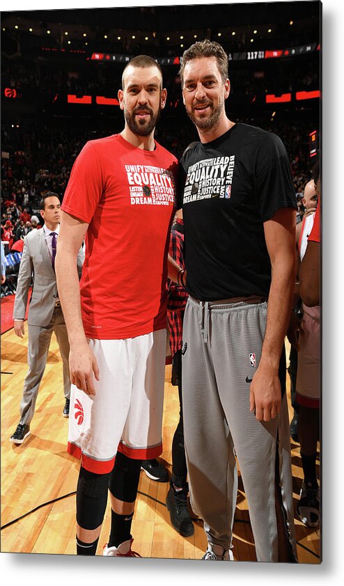Nba Pro Basketball Metal Print featuring the photograph Marc Gasol and Pau Gasol by Ron Turenne