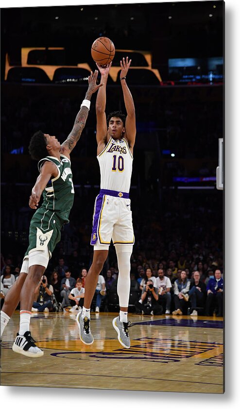 Nba Pro Basketball Metal Print featuring the photograph Milwaukee Bucks v Los Angeles Lakers by Juan Ocampo