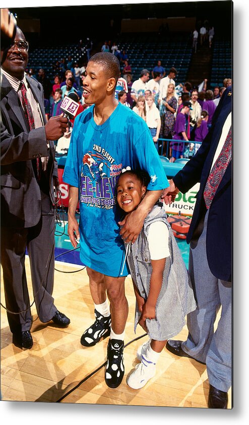 Nba Pro Basketball Metal Print featuring the photograph Muggsy Bogues by Nathaniel S. Butler