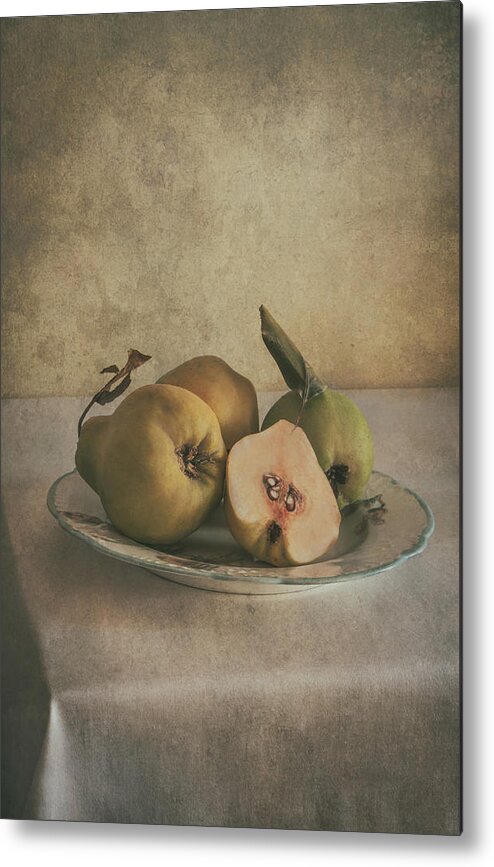 Still Life Metal Print featuring the photograph Plate of fresh quince by Jaroslaw Blaminsky