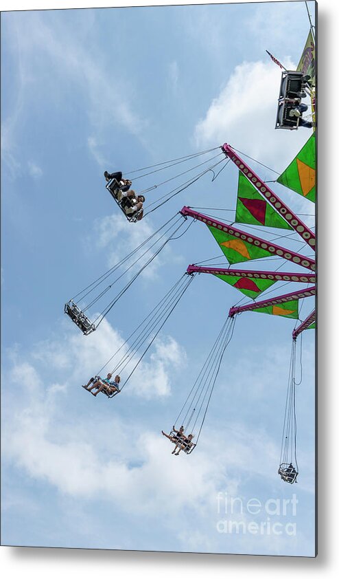 2018 Metal Print featuring the photograph Riders on a swing carousel at a county fair by William Kuta