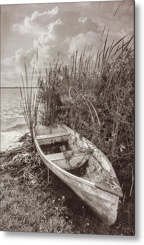 Boats Metal Print featuring the photograph Rowboat in the Marsh in Sepia Tones by Debra and Dave Vanderlaan