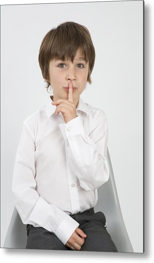 Finger On Lips Metal Print featuring the photograph School Boy With Finger On Lips For Silence by Nicola Tree