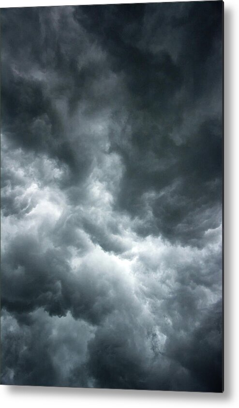 Clouds Metal Print featuring the photograph Stormy clouds in the sky. by Bernhard Schaffer