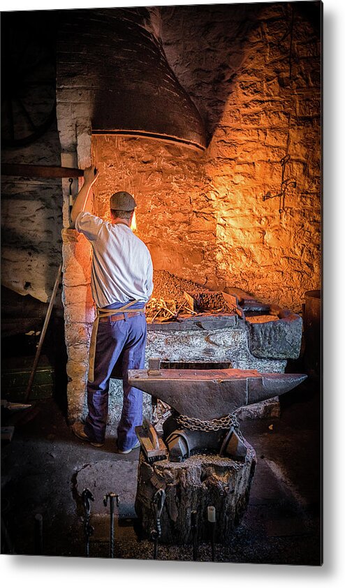 Blacksmith Metal Print featuring the photograph The Blacksmith 2 by Nigel R Bell