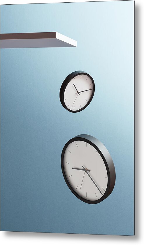 Problems Metal Print featuring the photograph Two clocks falling from a shelf by Richard Drury