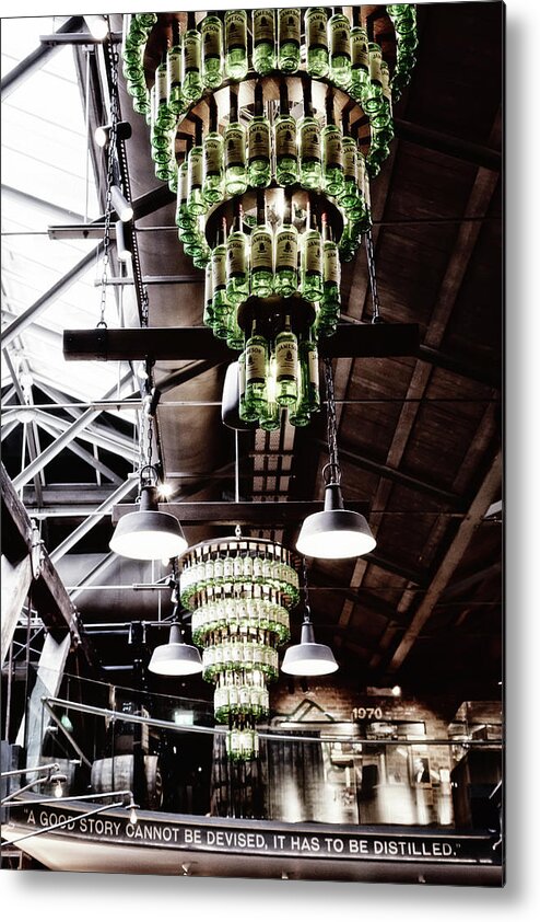 Whiskey Chandeliers Metal Print featuring the photograph Whiskey Bottle Chandelier at the Jameson Distillery by Georgia Clare