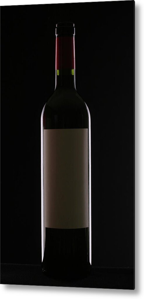 Alcohol Metal Print featuring the photograph Bottle Of Red Wine On Black Background by Donald gruener