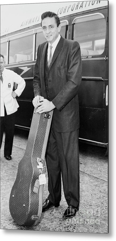Country And Western Music Metal Print featuring the photograph Johnny Cash Standing With Guitar Case by Bettmann