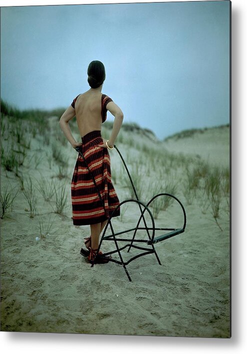 Fashion Metal Print featuring the photograph A Model On A Beach by Serge Balkin