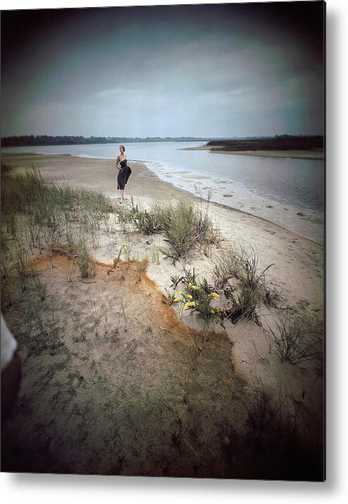 Fashion Metal Print featuring the photograph A Model Wearing A Dress On A Beach by Serge Balkin
