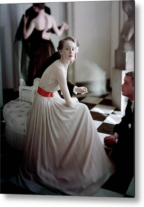 Beauty Metal Print featuring the photograph A Model Wearing A Harry Keiser Dress by Frances Mclaughlin-Gill