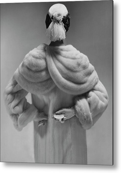 Accessories Metal Print featuring the photograph A Model Wearing A Mink Coat by Erwin Blumenfeld
