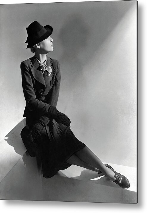 Accessories Metal Print featuring the photograph A Model Wearing Molyneux And A Hat By Descat by Horst P. Horst