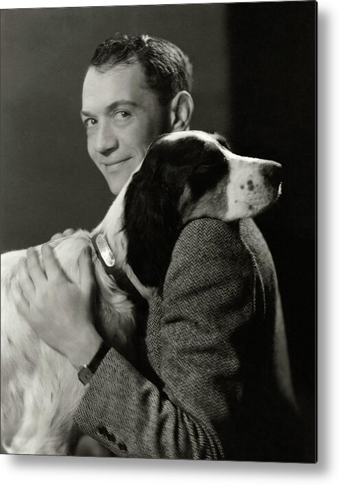 Animal Metal Print featuring the photograph A Portrait Of John Held Jr. Hugging A Dog by Nickolas Muray