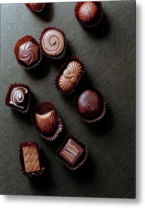 Cooking Metal Print featuring the photograph A Selection Of Chocolates by Romulo Yanes