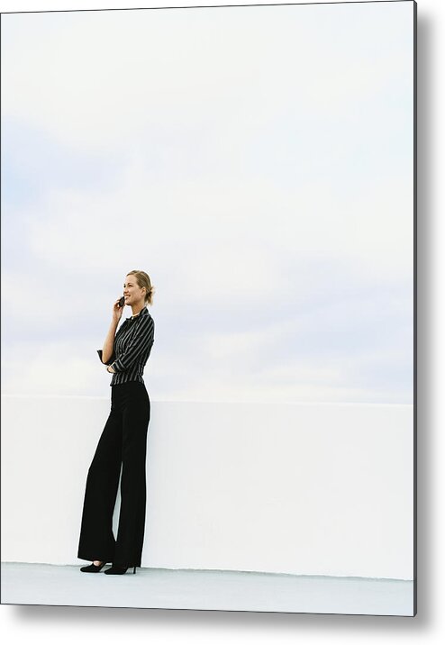 Caucasian Ethnicity Metal Print featuring the photograph Businesswoman Outdoors Using Her Mobile Phone by Digital Vision.