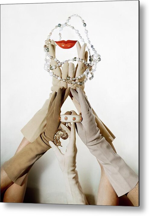 Accessories Metal Print featuring the photograph Gloved Hands Holding Jewelry by John Rawlings