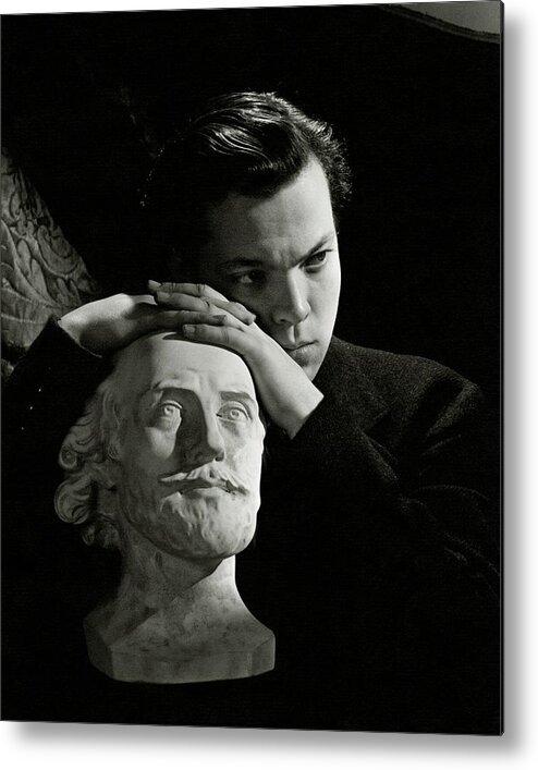 Artist Metal Print featuring the photograph Orson Welles Resting On A Sculpture by Cecil Beaton