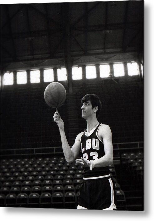 Classic Metal Print featuring the photograph Pete Maravich Spinning Ball On Finger by Retro Images Archive