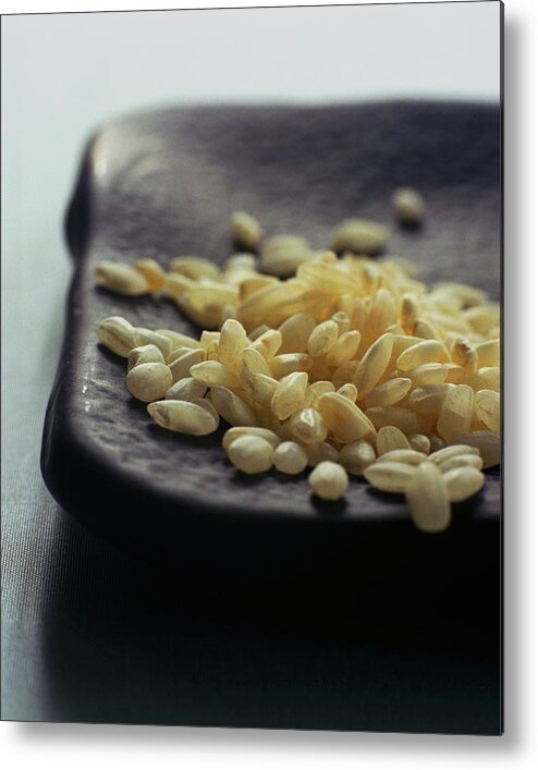 Grains Metal Print featuring the photograph Rice On A Black Plate by Romulo Yanes