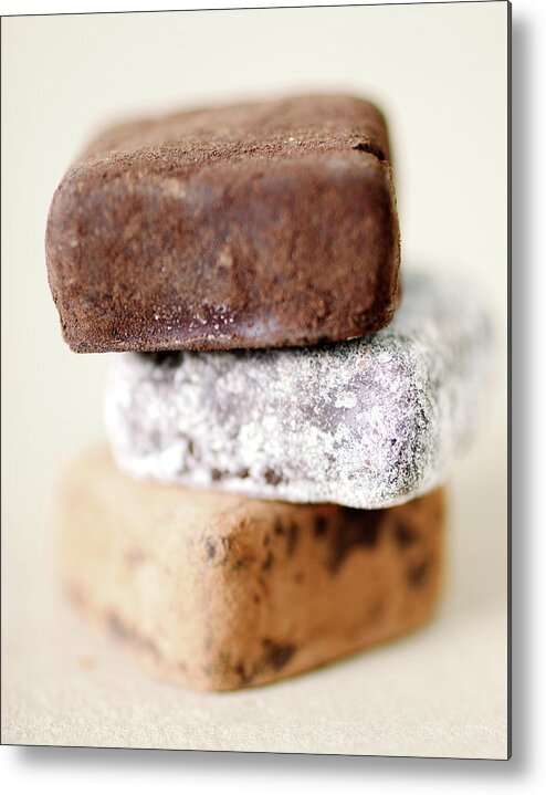White Background Metal Print featuring the photograph Studio Shot Of Truffle Candies by Johner Images