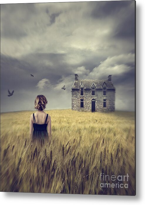 Alone Metal Print featuring the photograph Woman walking in wheat field with abandoned house in background by Sandra Cunningham