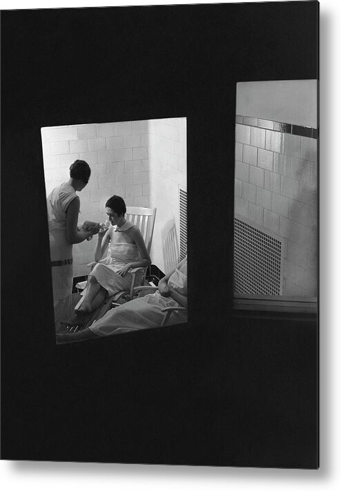 Beauty Metal Print featuring the photograph Women Relaxing In A Hot Room by Lusha Nelson