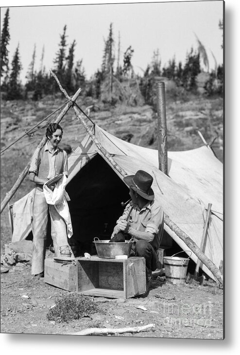 1930s Metal Print featuring the photograph Couple Roughing It, C.1930s by H. Armstrong Roberts/ClassicStock
