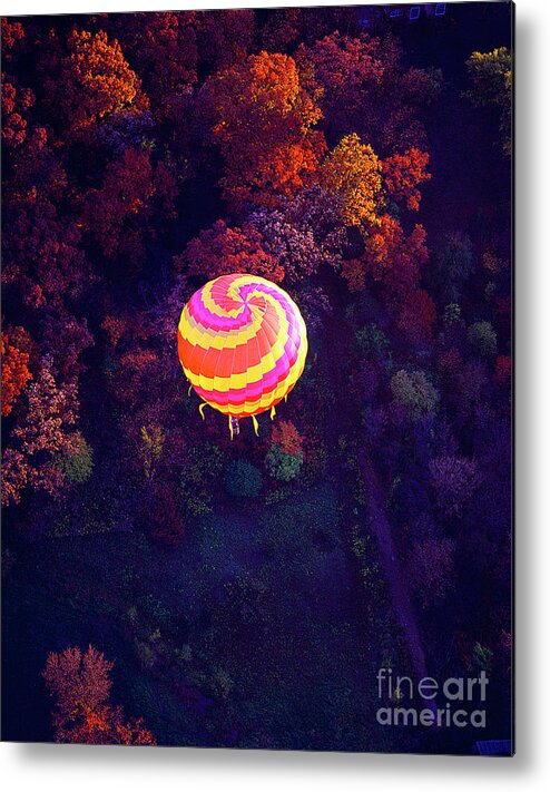 Spiral Metal Print featuring the photograph Spiral colored hot air balloon over fall tree tops Mchenry  by Tom Jelen