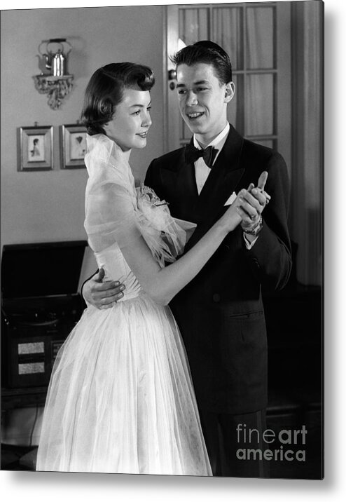 1950s Metal Print featuring the photograph Teen Couple Dancing, C.1950s by H. Armstrong Roberts/ClassicStock