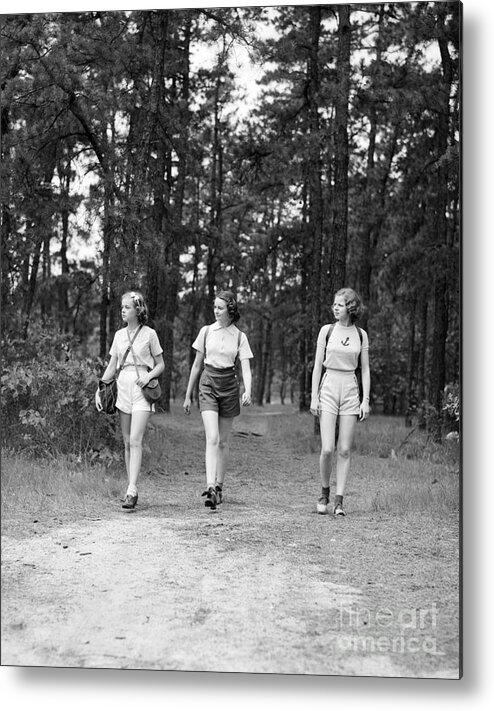 1940s Metal Print featuring the photograph Teen Girls Hiking, C.1940s by H. Armstrong Roberts/ClassicStock