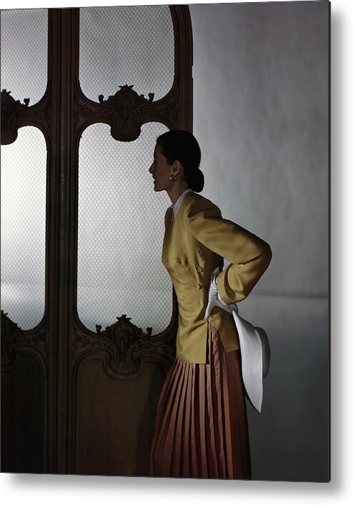 Fashion Metal Print featuring the photograph Model In A Vogue Patterns Ensemble #1 by Horst P. Horst