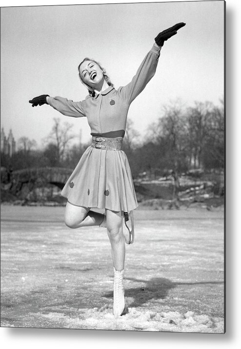 People Metal Print featuring the photograph Woman Ice Skating #1 by George Marks