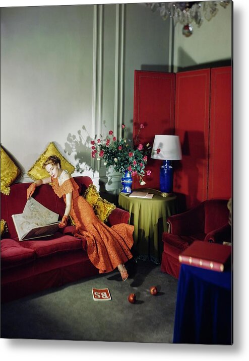 #new2022vogue Metal Print featuring the photograph Actress Ruth Ford Viewing Illustrations by Cecil Beaton