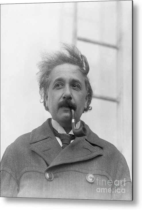 Physicist Metal Print featuring the photograph Albert Einstein Smoking A Pipe by Bettmann