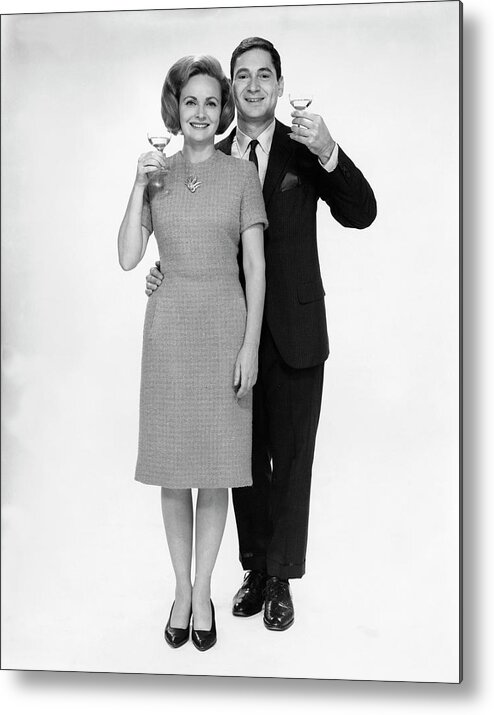 Heterosexual Couple Metal Print featuring the photograph Couple Drinking Champagne by George Marks