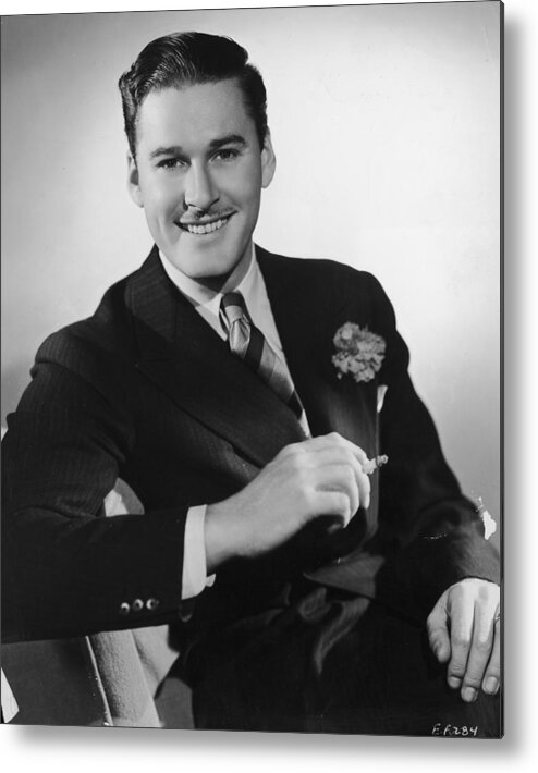 Smoking Metal Print featuring the photograph Dapper Flynn by Hulton Archive
