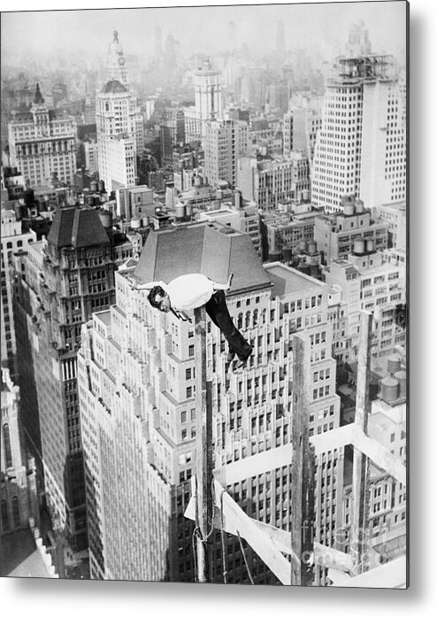 People Metal Print featuring the photograph Daredevil Doing Balancing Act by Bettmann