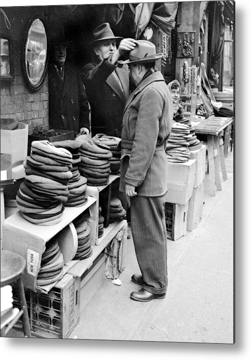 1940-1949 Metal Print featuring the photograph Harry Kregman, Owner Of Hats & Caps, At by New York Daily News Archive