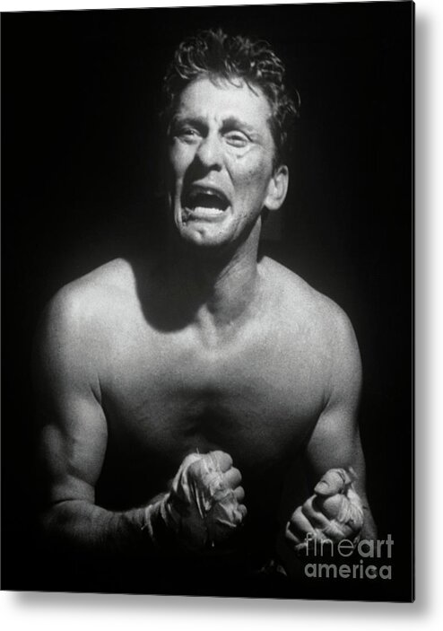 Fist Metal Print featuring the photograph Kirk Douglas Grimacing In Boxing Scene by Bettmann