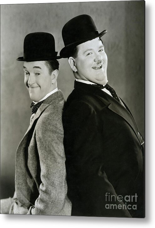 Oliver Hardy Metal Print featuring the photograph Laurel And Hardy by Bettmann