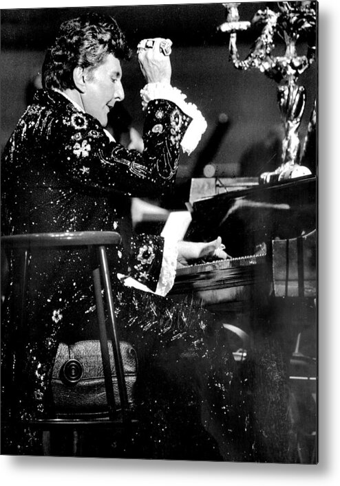 1980-1989 Metal Print featuring the photograph Liberace Takes His Turn At The Piano At by New York Daily News Archive