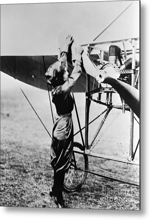 People Metal Print featuring the photograph Pilot Harriet Quimby Starting Airplane by Bettmann