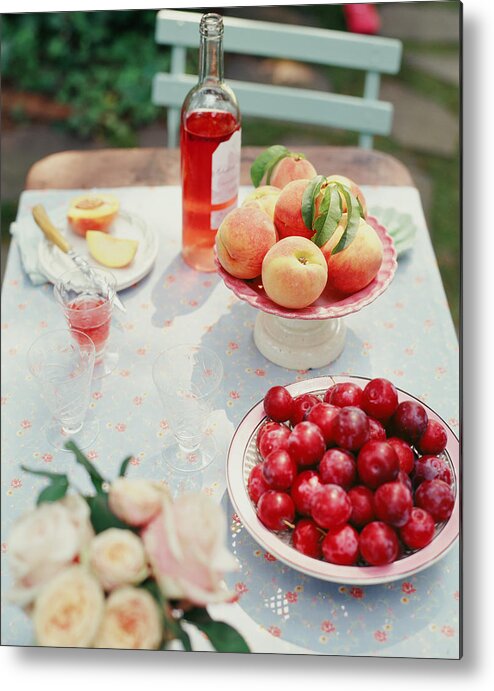 Plum Metal Print featuring the photograph Plums, Peaches, Wine And Flowers On A by Victoria Pearson