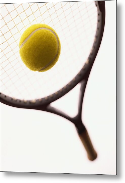 Tennis Metal Print featuring the photograph Tennis Racket And Ball, Close-up by David Sacks