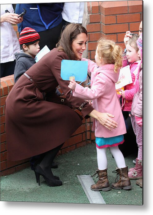 Child Metal Print featuring the photograph The Duchess Of Cambridge Visits Liverpool #1 by Chris Jackson