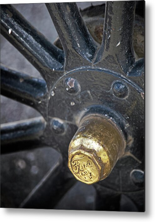 Ford Metal Print featuring the photograph Antique Ford wheel by M Kathleen Warren