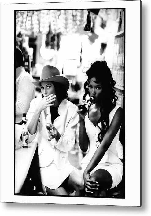 Accessories Metal Print featuring the photograph Christy Turlington and Naomi Campbell at the Central Grocery, New Orleans by Arthur Elgort