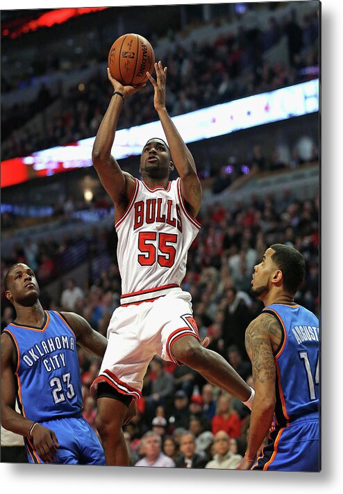 Chicago Bulls Metal Print featuring the photograph Dion Waiters, E'twaun Moore, and D.j. Augustin by Jonathan Daniel